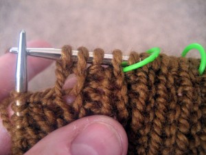 knit into the next stitch