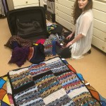 In Vanna's closet, laying out the afghans for the shoot