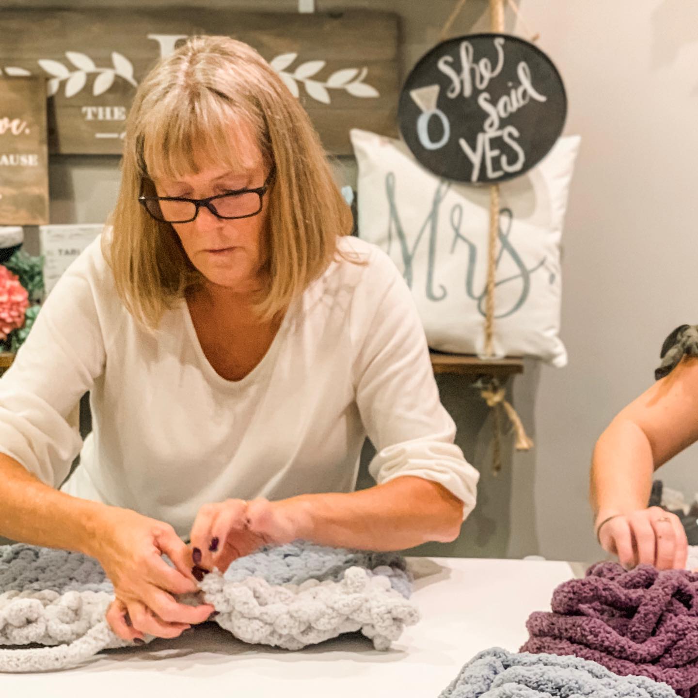Women Knitting in a Yarn Store